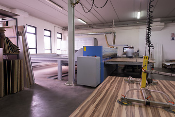 Image showing worker in a factory of wooden furniture