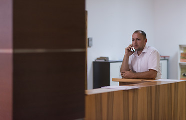 Image showing designer in his furniture manufacturing workshop