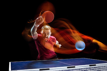 Image showing The table tennis player serving