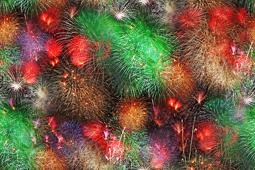 Image showing Big fireworks in the night summer sky as a seamless background