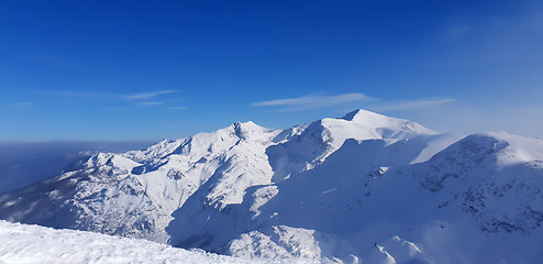 Image showing Panoramic view of the snowy mountains ski resort Vogel in Sloven