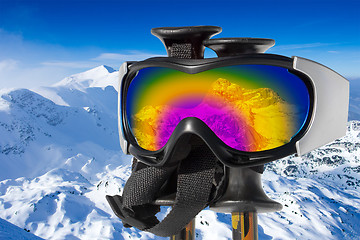 Image showing Reflection of the snowy mountain Triglav in ski goggles on ski s