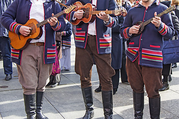 Image showing Traditional Croatian musicians in Slavonian costumes play in the