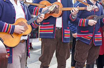 Image showing Traditional Croatian musicians in Slavonian costumes play in the