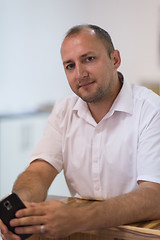 Image showing designer in his furniture manufacturing workshop