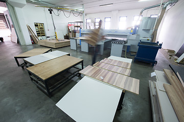 Image showing worker in a factory of wooden furniture