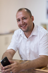 Image showing designer in his furniture manufacturing workshop