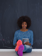 Image showing Happy African American Woman Using Digital Tablet