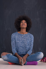 Image showing African American woman isolated on a gray background