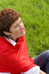 Image showing woman sitting on the grass