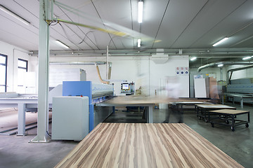 Image showing worker in a factory of wooden furniture