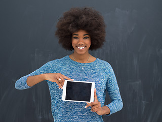 Image showing Happy African American Woman Using Digital Tablet