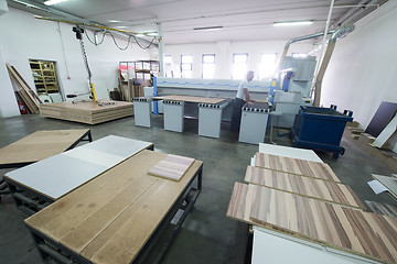 Image showing worker in a factory of wooden furniture