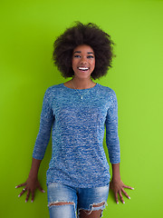 Image showing black woman isolated on a Green background