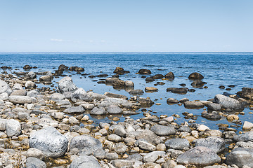 Image showing Stones and blue water