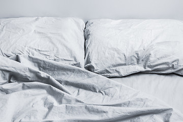 Image showing Messy gray bed linen