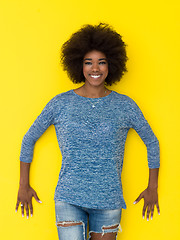 Image showing black woman isolated on a Yellow background