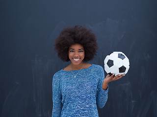 Image showing black woman holding a soccer bal