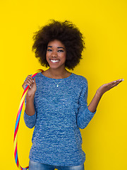 Image showing black woman isolated on a Yellow background