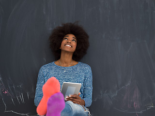 Image showing Happy African American Woman Using Digital Tablet