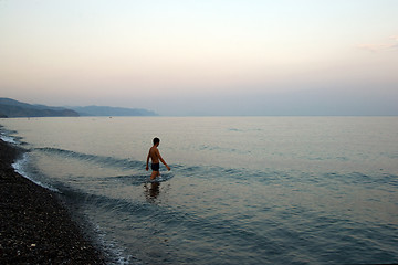 Image showing Swimming at dusk