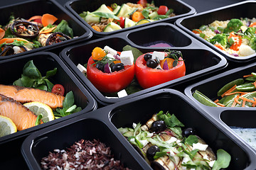 Image showing Lunch boxes, delicious and healthy dinner dishes.Catering, dinner dishes in boxes.