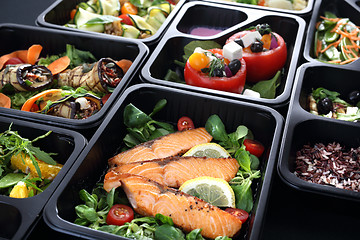 Image showing Lunch boxes, delicious and healthy dinner dishes