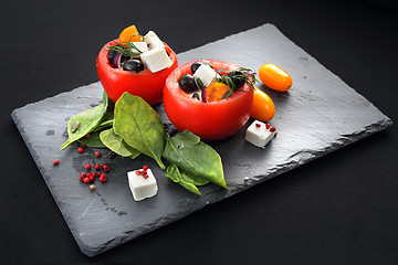 Image showing Vegetable appetizer. Stuffed tomatoes.