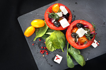 Image showing Vegetable appetizer. Stuffed tomatoes.