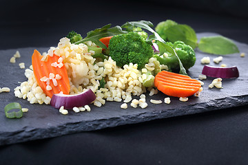 Image showing Dinner dish, rice with broccoli and carrots.