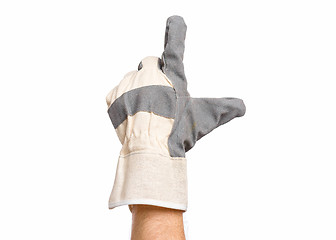 Image showing Male hand wearing working glove