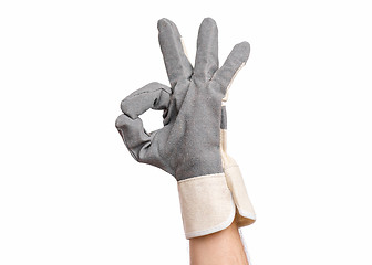 Image showing Male hand wearing working glove