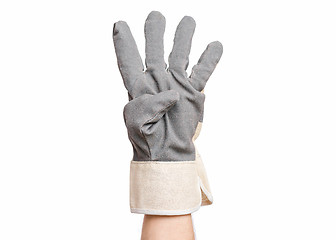 Image showing Male hand wearing working glove