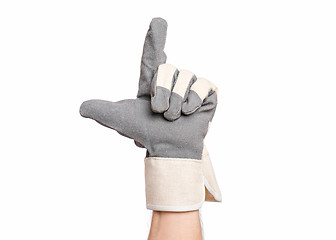 Image showing Male hand wearing working glove