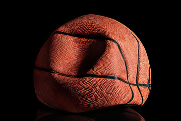 Image showing Deflated and rumpled old basketball ball