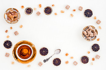 Image showing Frame made of tea, sugar and dried lemon slices