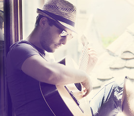 Image showing Man playing the guitar