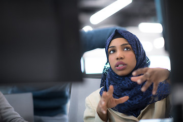 Image showing black muslim female software developer at work