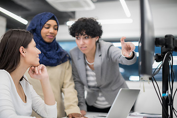 Image showing multiethnics team of software developers working together