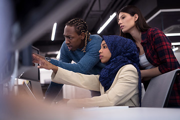 Image showing multiethnics team of software developers working together