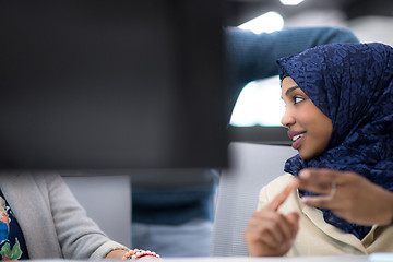 Image showing black muslim female software developer at work