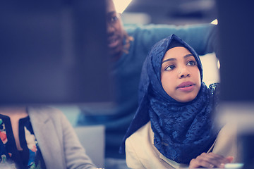 Image showing black muslim female software developer at work