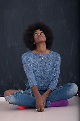 Image showing African American woman isolated on a gray background