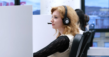 Image showing female call centre operator doing her job