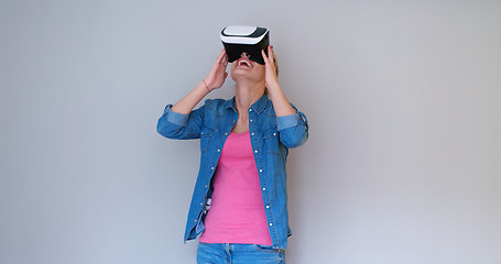 Image showing girl using VR headset glasses of virtual reality