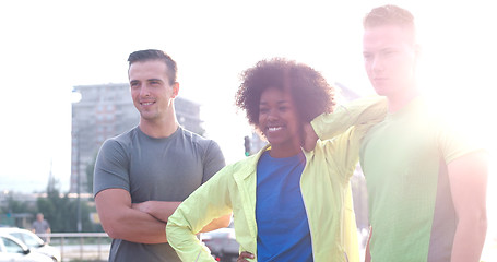 Image showing Portrait of multiethnic group of young people on the jogging