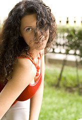 Image showing beautiful brunet woman in red