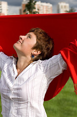 Image showing redhead woman with red scarf