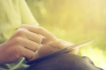 Image showing Man holding tablet