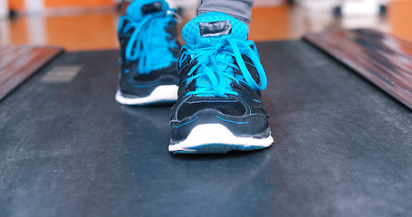 Image showing black female feet in sneakers